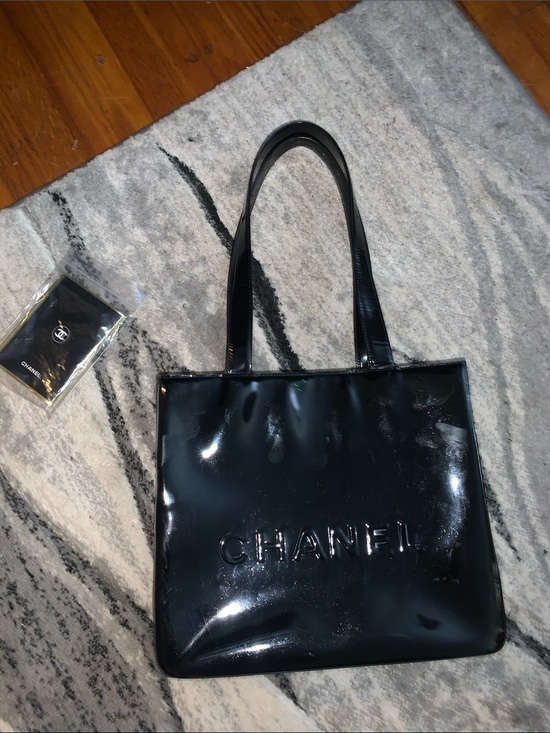 CHANEL Handbags - CHANEL Black Patent Embossed Logo Tote